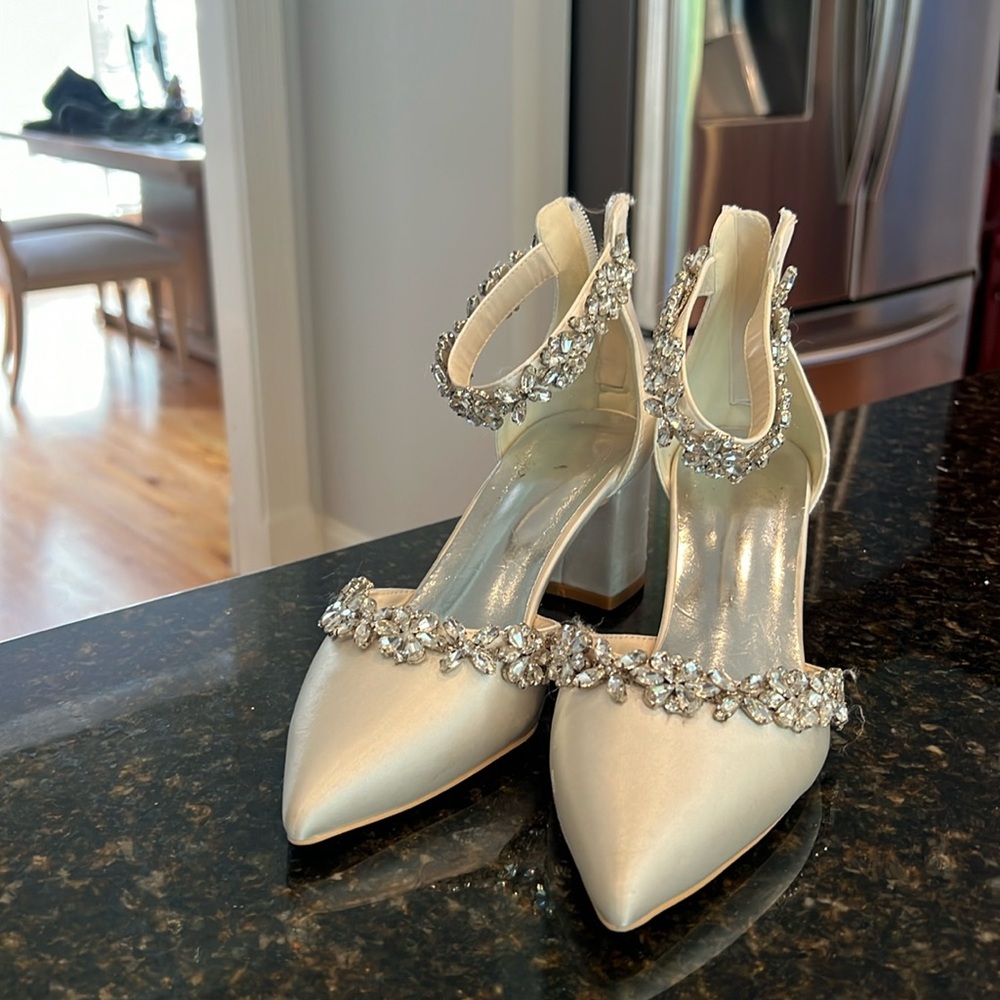 Beautiful bridal shoes worn once for wedding.